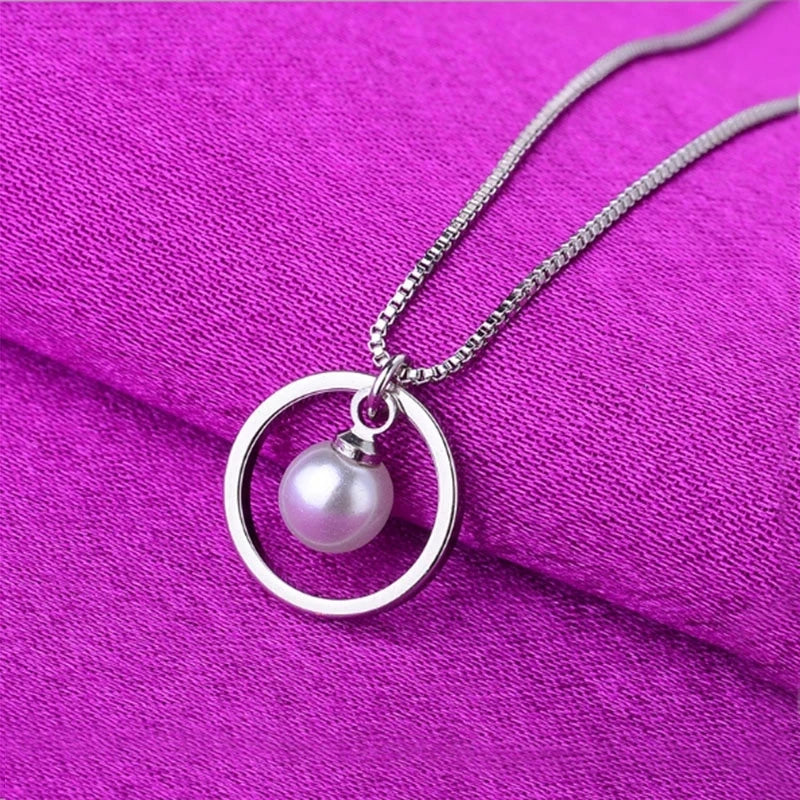 Circle of Elegance: Pearl Pendant Necklace for Daughter